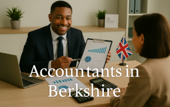A professional accountant in a modern Berkshire office explains financial charts to a client across a tidy desk with a laptop, spreadsheets, and calculators. A small British flag and HMRC document in the background suggest a UK business setting. Overlay text reads Accountants in Berkshire