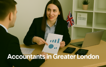 A professional accountant in a modern Greater London office explains financial charts to a client across a tidy desk with a laptop, spreadsheets, and calculators. A small British flag and HMRC document in the background suggest a UK business setting. Overlay text reads Accountants in Greater London