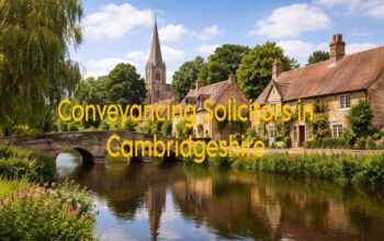 Beautiful residential homes in Cambridgeshire with house keys and signed property documents on a desk, representing professional conveyancing and secure property transactions in the UK.