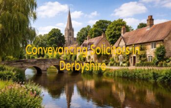 Picturesque Derbyshire homes with house keys and property documents on a desk, representing professional conveyancing and secure property transactions in the UK.